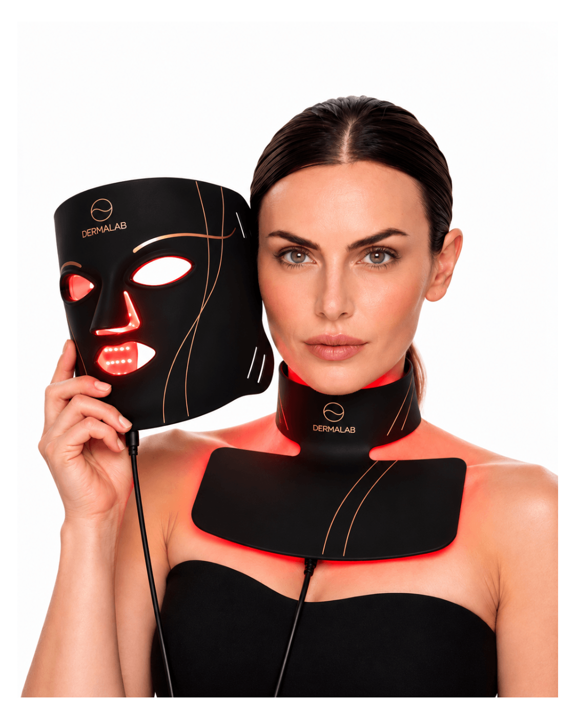 A woman wearing a black DERMAlab LED neck and face mask therapy system, holding a matching black LED face mask in front of her face against a white background.